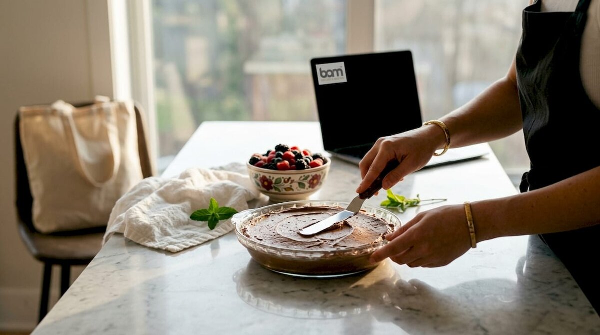 Hands preparing no-bake chocolate mousse dessert