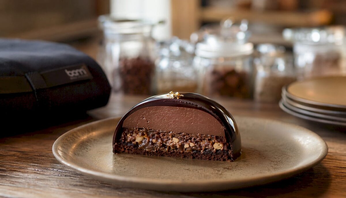 Close-up layered dessert with chocolate shell